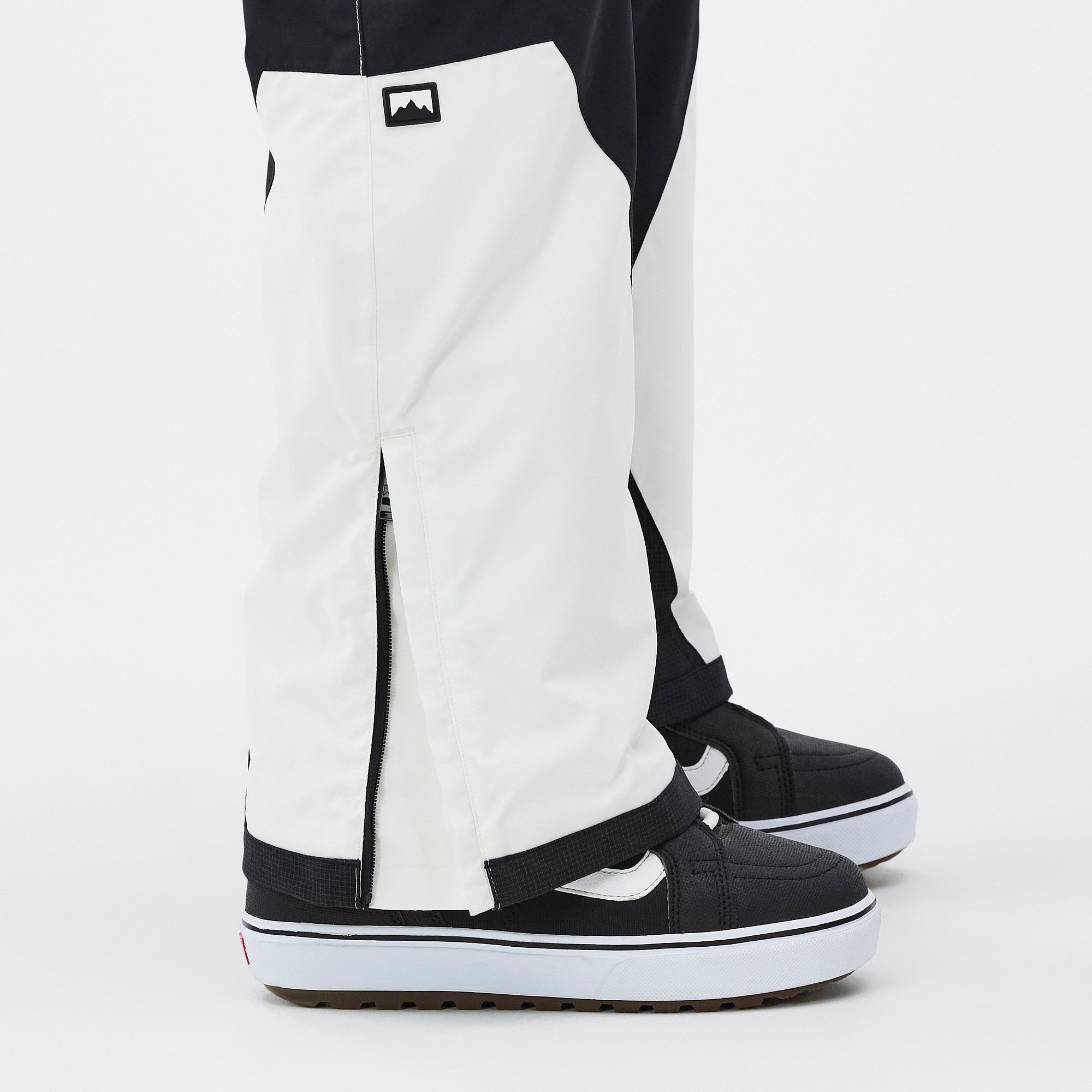 Black fashion and white snow pants